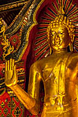 Chiang Mai - The Wat Chedi Luang, the viharn, or worship hall. Detail of the Buddha statue of the main altar.